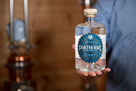 hand holding porthcawl gin bottle
